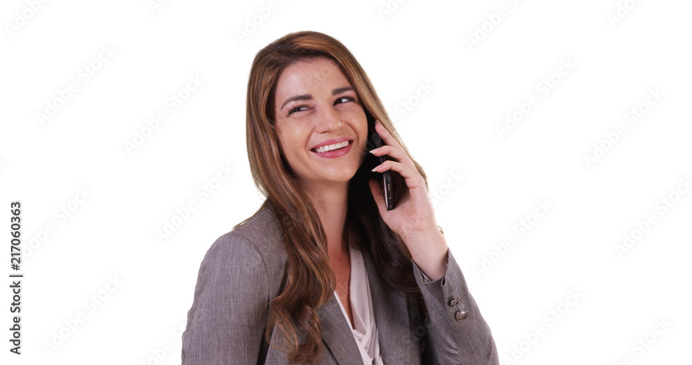 Portrait of professional white female having chat on phone on white background Portrait of professional white female having chat on phone on white background