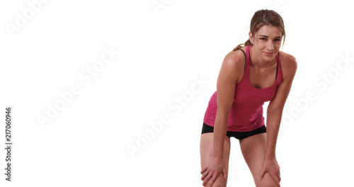 Healthy young white female on white background tired after working out