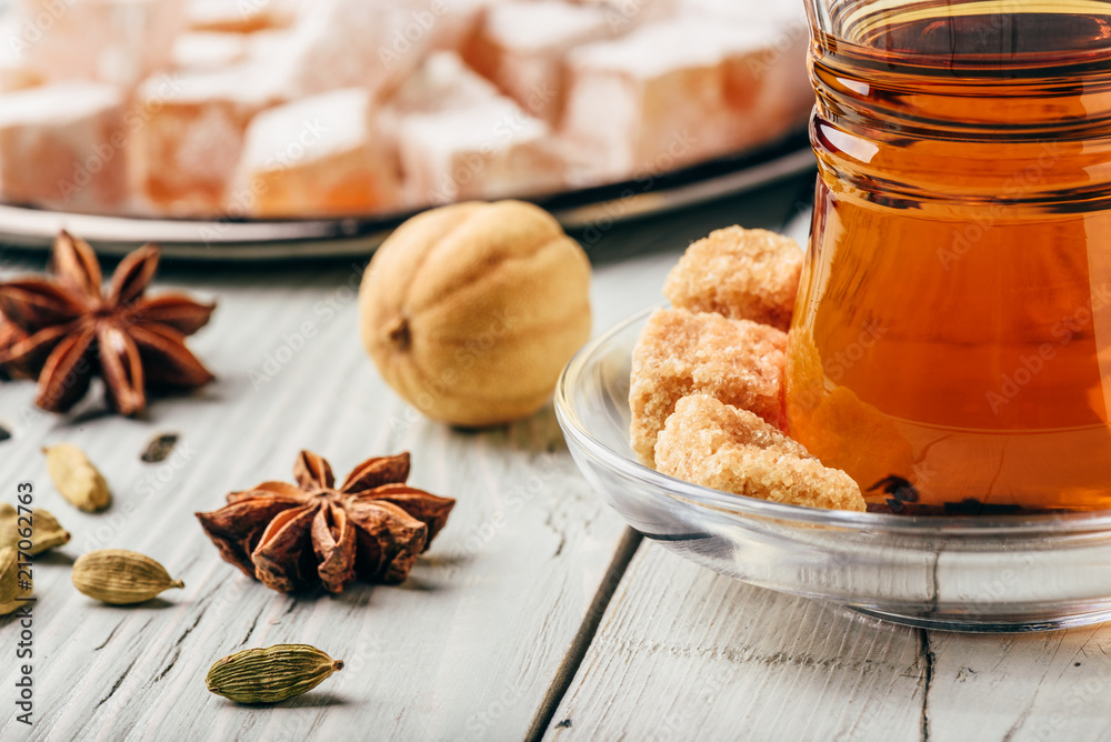 Asian tea with turkish delight Rahat Lokum and different spices Asian tea with turkish delight Rahat Lokum and different spices