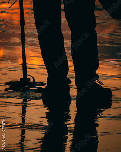 Using a Metal Detector to Search for Treasure photo