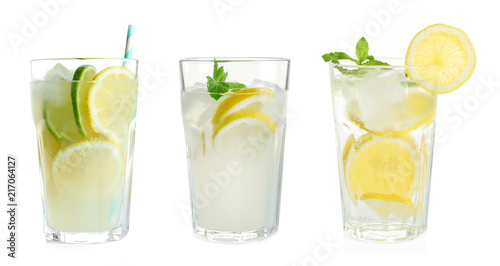 Photographie Set with fresh lemonade on white background