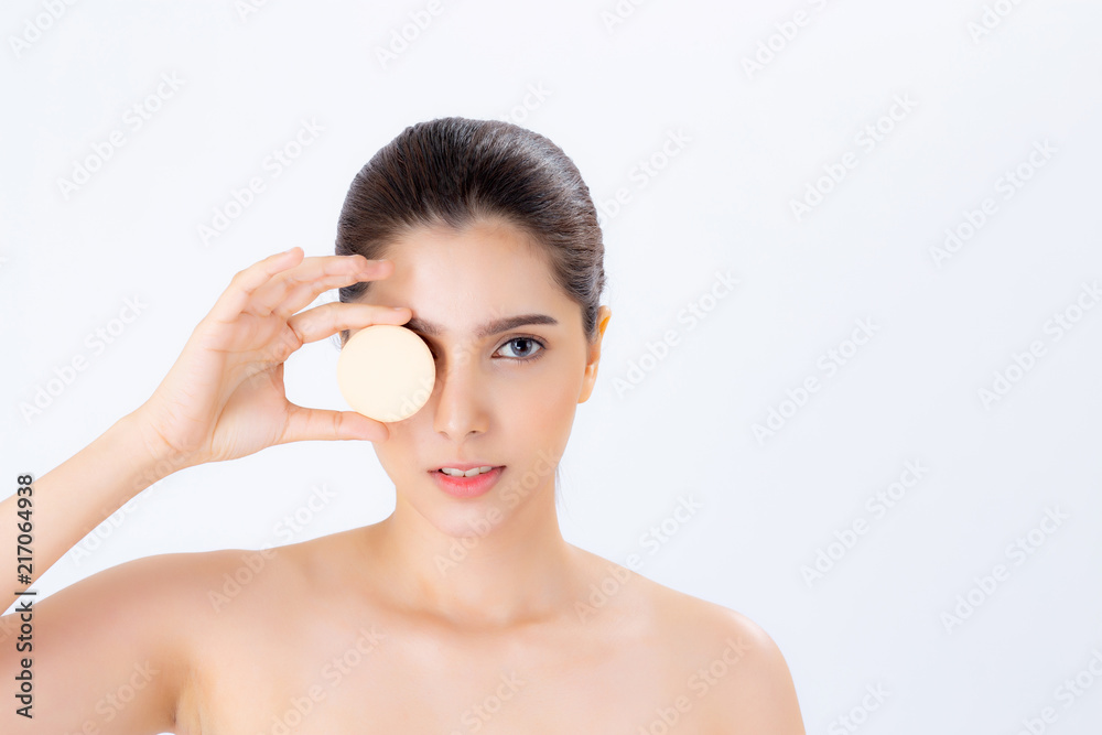 Portrait of beautiful asian woman applying powder puff at cheek makeup of cosmetic, beauty of girl with face smile isolated on white background, wellness and healthcare concept. Portrait of beautiful asian woman applying powder puff at cheek makeup of cosmetic, beauty of girl with face smile isolated on white background, wellness and healthcare concept.
