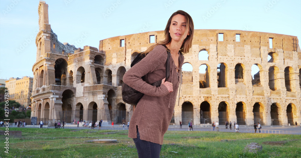 Happy attractive Caucasian woman sightseeing in Rome