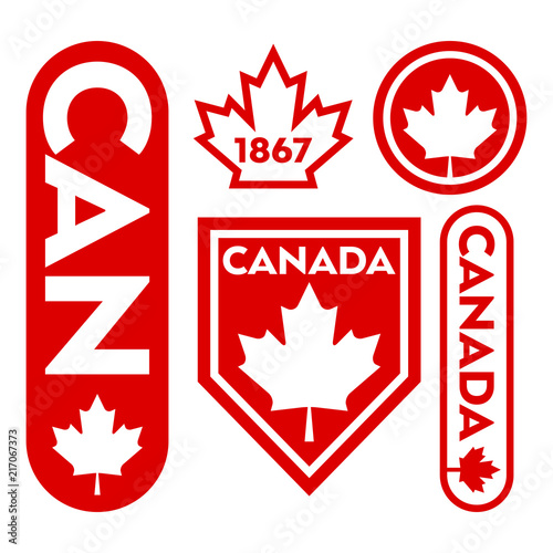 A collection of Canadian badges.
