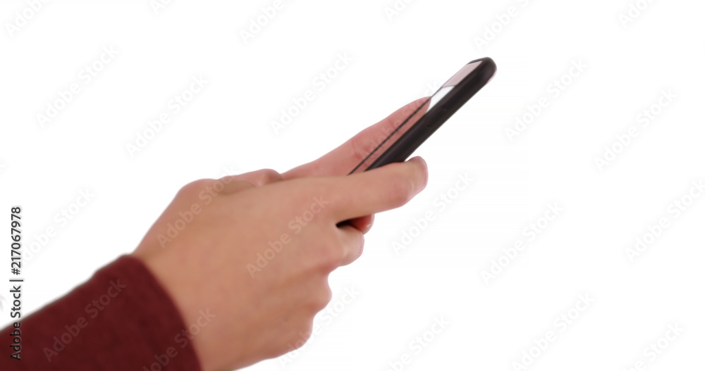 Close up of woman hands texting on white background Close up of woman hands texting on white background