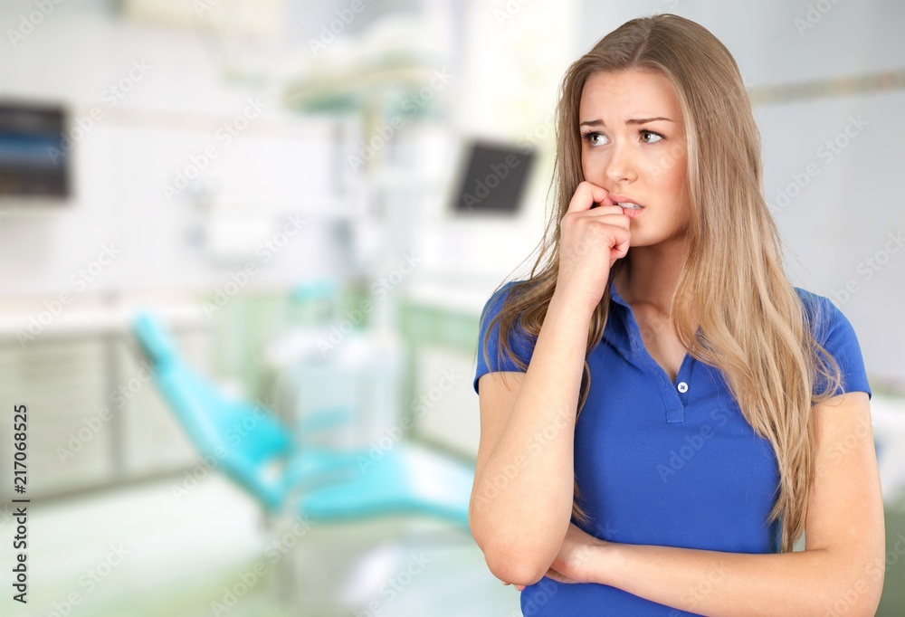 Fototapeta premium Beautiful woman thinking and looking worried