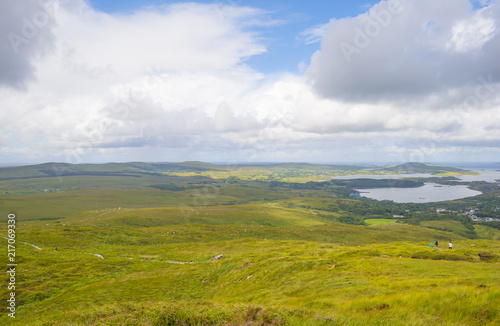 Fototapeta Naklejka Na Ścianę i Meble -  Panorama of mountains, marshy land and heathland of Connemara National Park in summer