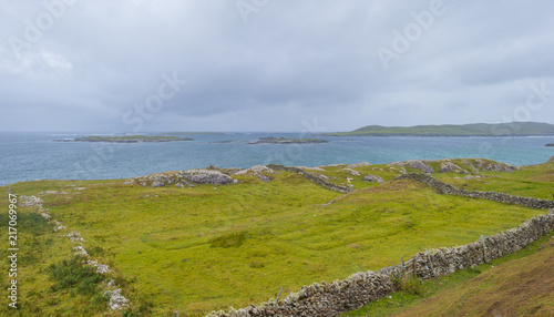 Panorama of the coast of an irish island in the atlantic ocean in summer