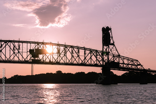 Old Two Lane Vertical Lift Bridge Needing Repairs at Sunset © Ryan