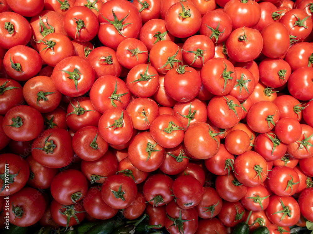 Red tomatoes background. Group of tomatoes Red tomatoes background. Group of tomatoes