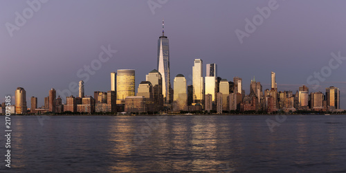 New York City   USA - JUL 19 2018  Lower Manhattan skyline at sunset view from Hudson riverside