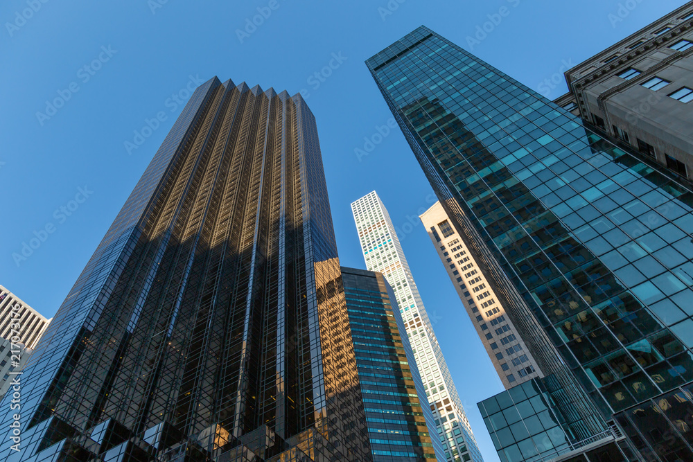 New York City / USA - JUL 19 2018: Midtown skyscrapers and buildings facade in Manhattan New York City / USA - JUL 19 2018: Midtown skyscrapers and buildings facade in Manhattan
