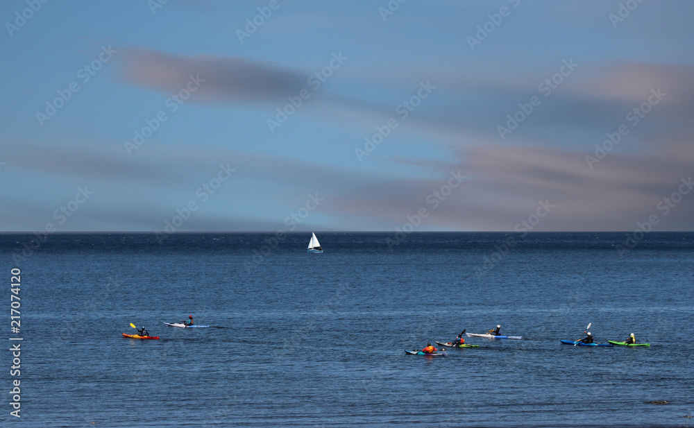 Sailboat and Kayaks in the Strait of Juan De Fuca near Sequim, Washington