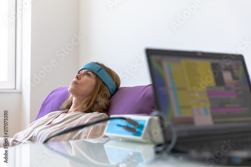 Biofeedback Patient Being Tested by Doctor