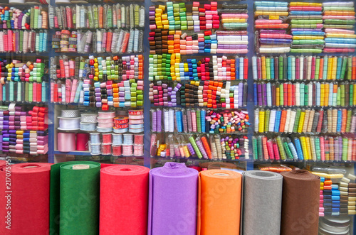 colorful ribbons on the shelf in the store photo