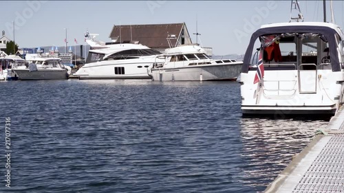 Yacht undocking from harbour. photo