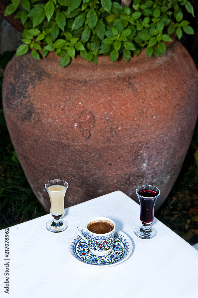 Lemon liqueur and cherry liqueur with Turkish coffee Lemon liqueur and cherry liqueur with Turkish coffee