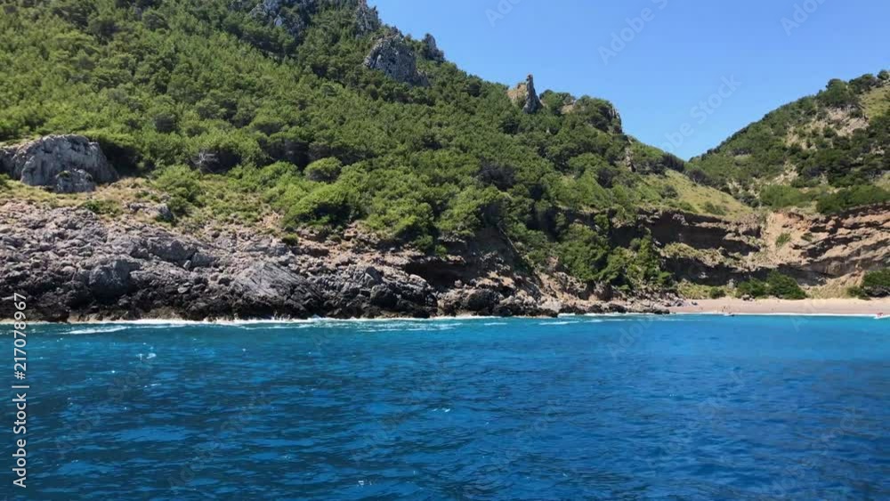 People enjoying the summer sailing on boat or spending a sunny day on the beach People enjoying the summer sailing on boat or spending a sunny day on the beach