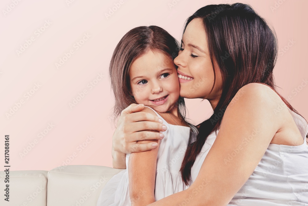 Happy Mother and daughter hugging Happy Mother and daughter hugging