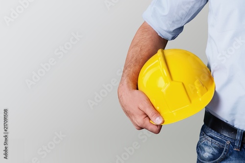 Worker man with helmet on background photo