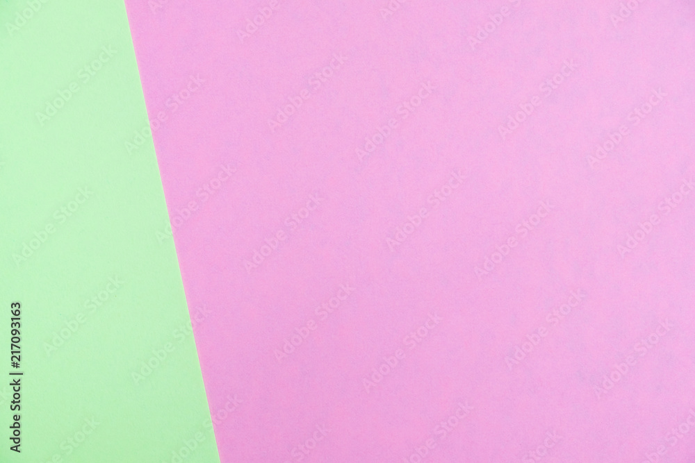 Pastel colored paper flat lay top view, background texture, green and pink Pastel colored paper flat lay top view, background texture, green and pink