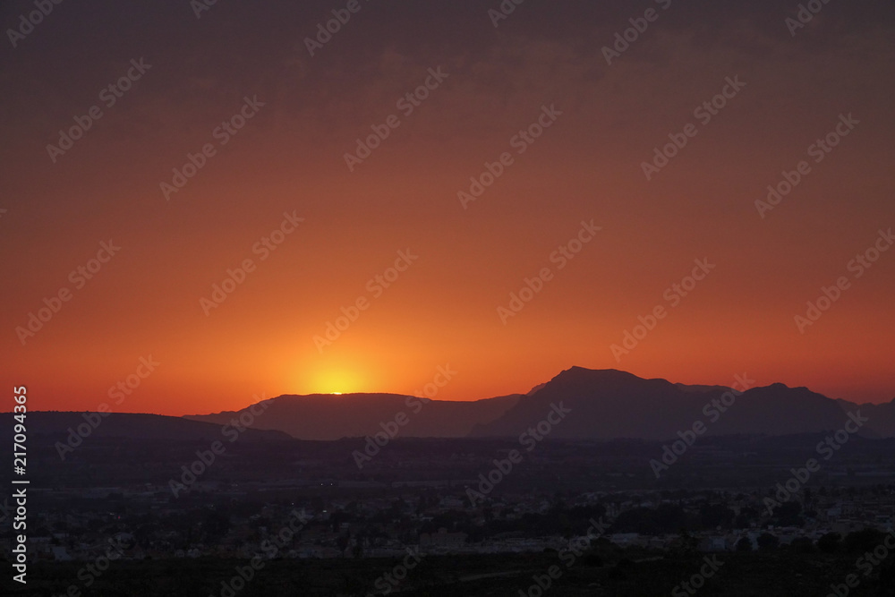 Obraz premium Sunset at mountains