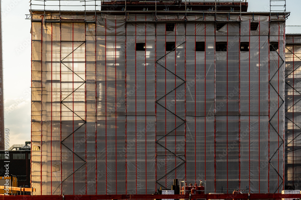 Obraz premium Construction scaffolding cover shut off industry