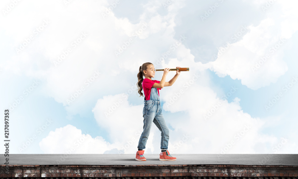 Concept of careless happy childhood with girl exploring this world Concept of careless happy childhood with girl exploring this world