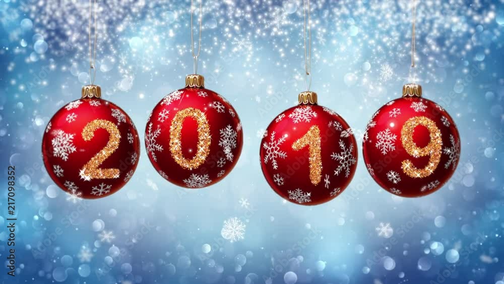 hanging 2019 number glitter Christmas balls on blue bokeh background. 4K