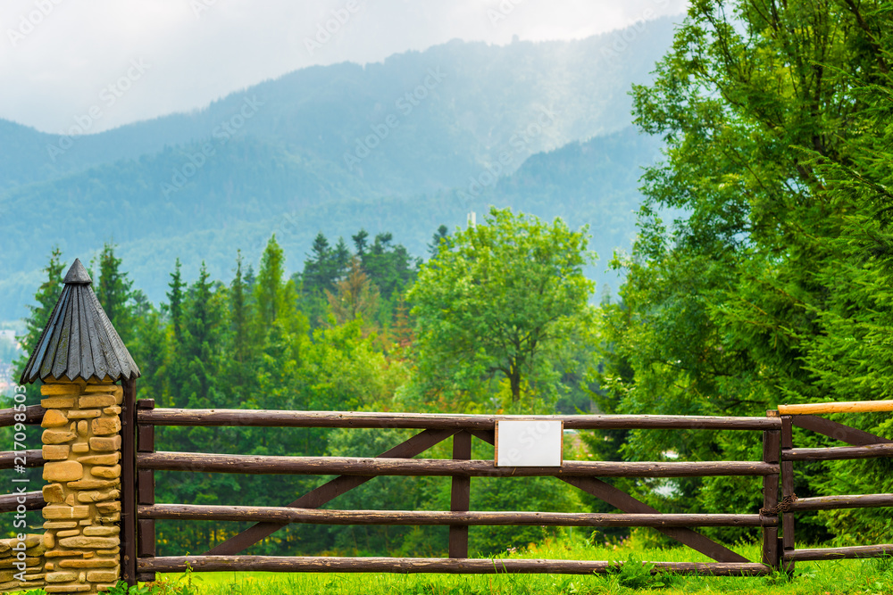 wooden fence, beautiful view of the mountains and forests