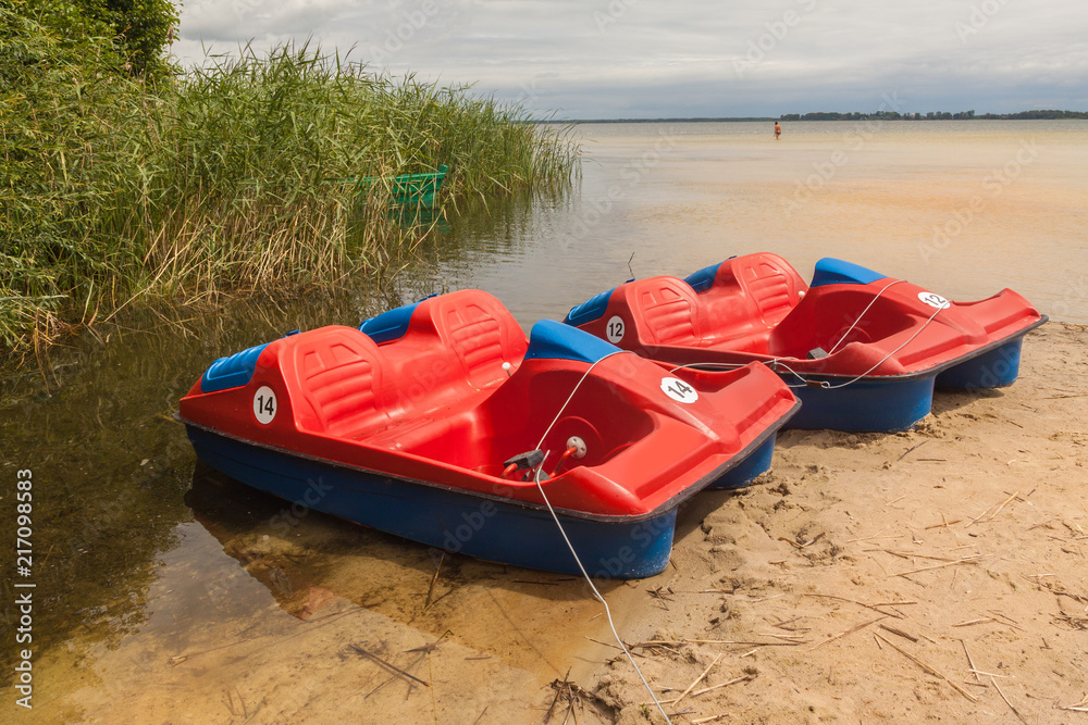 Catamarans on the shore of the Lake Svitiaz Catamarans on the shore of the Lake Svitiaz