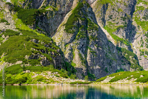 beautiful picturesque mountains of the Tatra  and a lake Czarny Staw with clear water