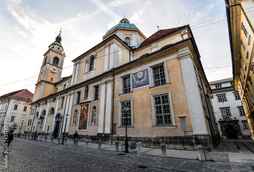 Ljubljana, Slovenia - May 20, 2018: Ljubljana Cathedral or St. Nicholas's Church stands at Cyril and Methodius Square, Ljubljana, Slovenia