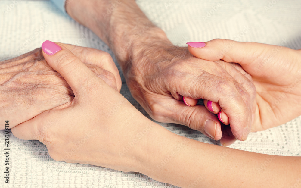 Fototapeta premium a care is at home of elderly