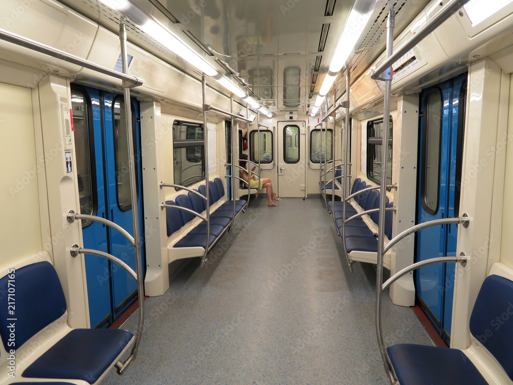 Obraz premium Interior of the Moscow metro car. Subway car with alone passenger