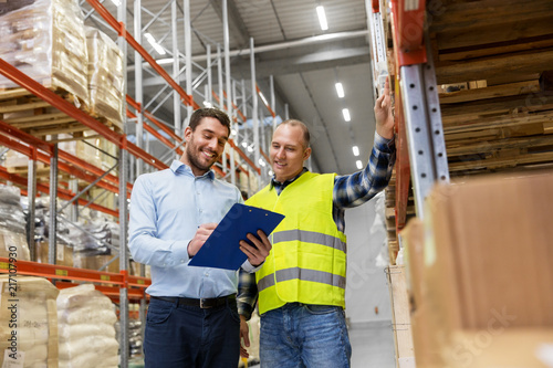 Принти на полотні wholesale, logistic business and people concept - manual worker and businessman