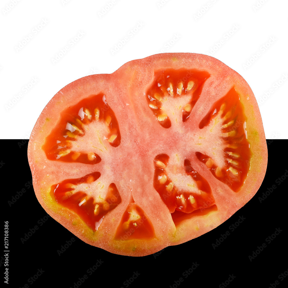 Tomato cut on white black background Tomato cut on white black background