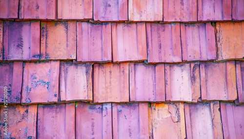 Roof tiles made from a ceramic material.