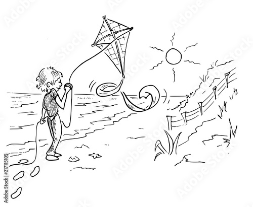 jongen met vlieger aan het strand
