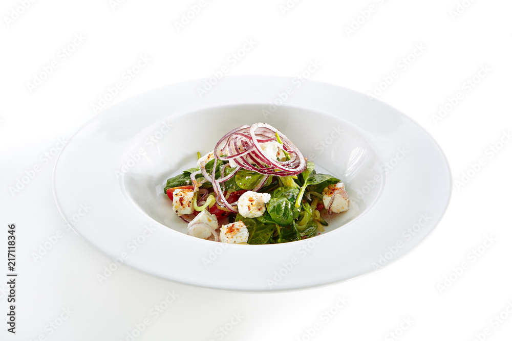 Salad with Goat Cheese, Spinach, Tomato and Onions Isolated