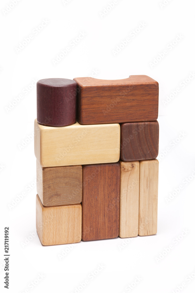Obraz premium wood block make a something stacked isolated white.