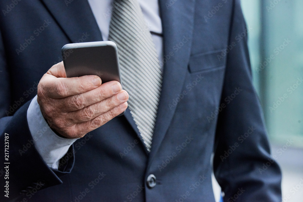 Senior man using smartphone Senior man using smartphone