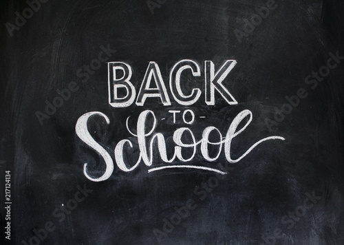Back to school chalk doodle background on blackboard