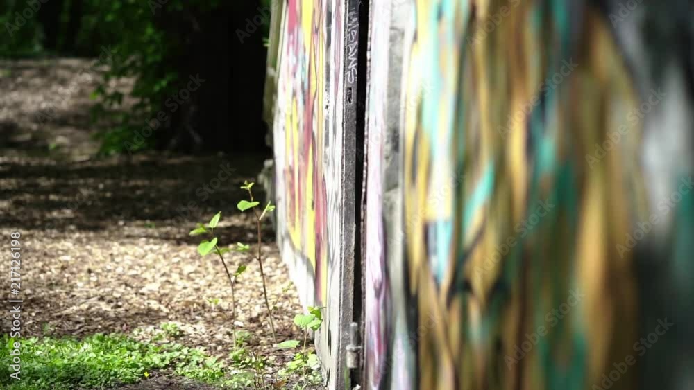 Abandoned concrete building with grafitti in nature in danish summertime. side shot. Abandoned concrete building with grafitti in nature in danish summertime. side shot.