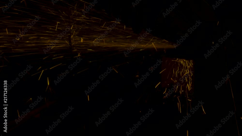 sparks effect - worker cutting iron
