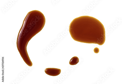 Schilderij op canvas Puddle of soy sauce isolated on a white background
