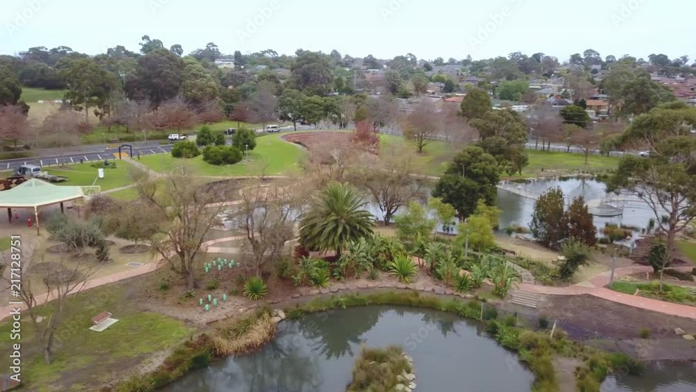 Panning shot of park in suburbs