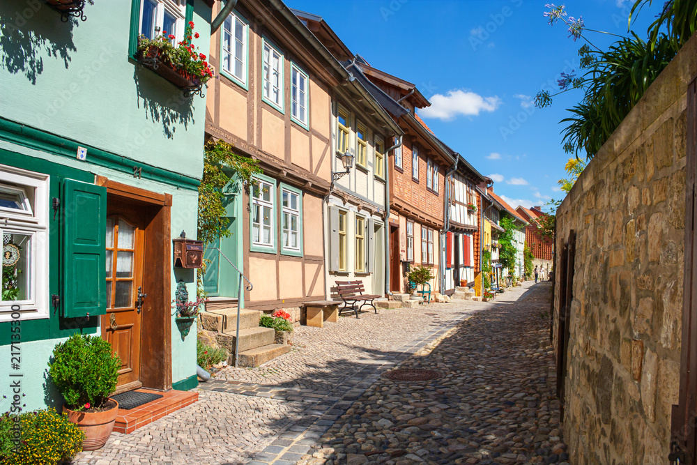 Fototapeta premium Medieval old town street in Quedlinburg, World Heritage Site, Harz, Northern Germany