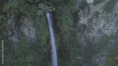 Beautiful slow motion waterfall coming from out of a native New Zealand forest. Just llike Lord of the Rings photo