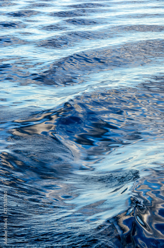 Waves on surface of water with cloudy sky Waves on surface of water with cloudy sky